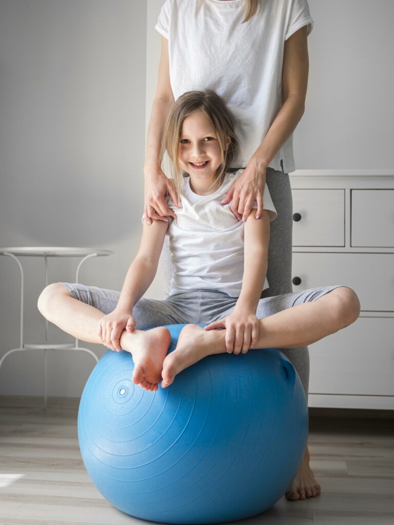 mom-girl-exercise-ball-together